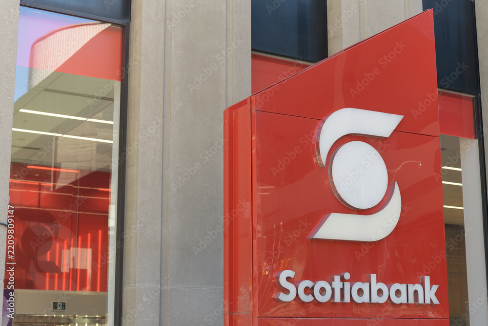 Fototapeta premium corporate logo sign of Scotiabank, the Bank of Nova Scotia outside a branch located at 392 Bay St, Toronto