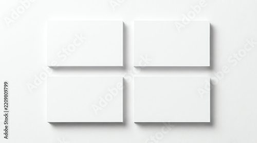 Mockup of four white business cards arranged in rows