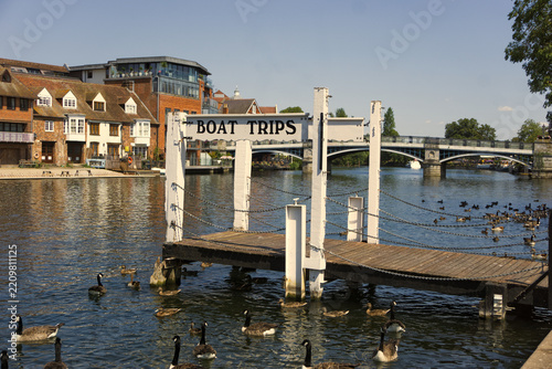 Wooden pier with a sign reading 