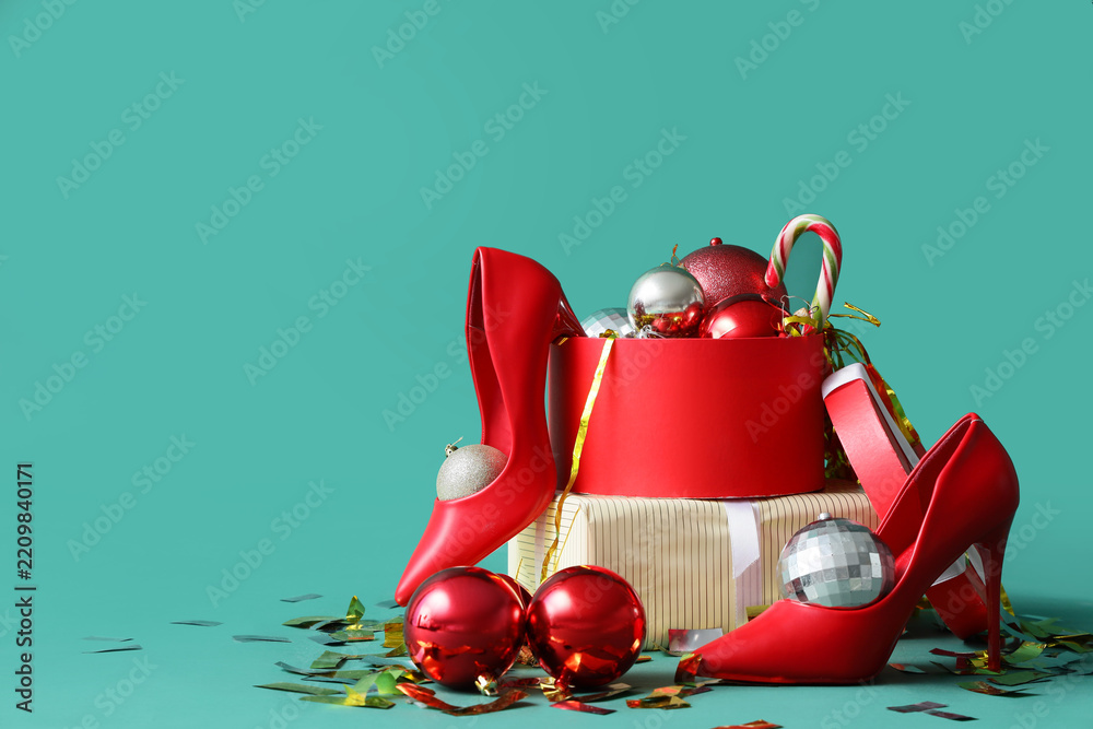 Obraz premium Christmas shopping and holiday fashion, red high heels with gift boxes and festive ornaments for seasonal sales and winter party celebration