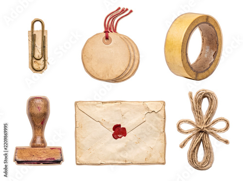 Assortment of vintage office and craft supplies with tags and twine
