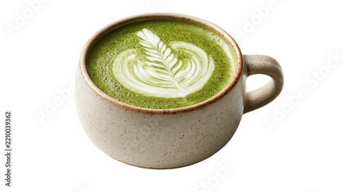 Matcha green tea latte with leaf pattern foam art in a speckled ceramic cup