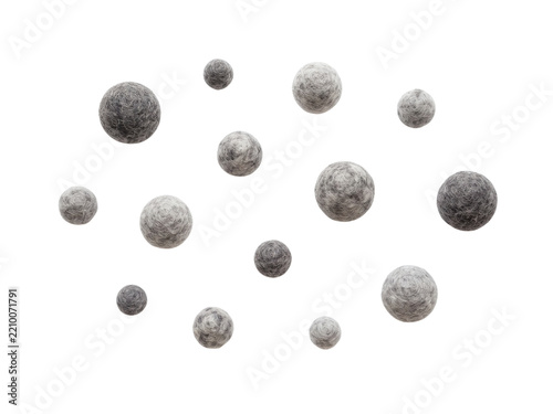 Grey felt wool balls isolated on a transparent background PNG