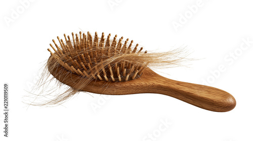 Obraz na plátně Wooden hairbrush with tangled blonde hair strands stuck in bristles