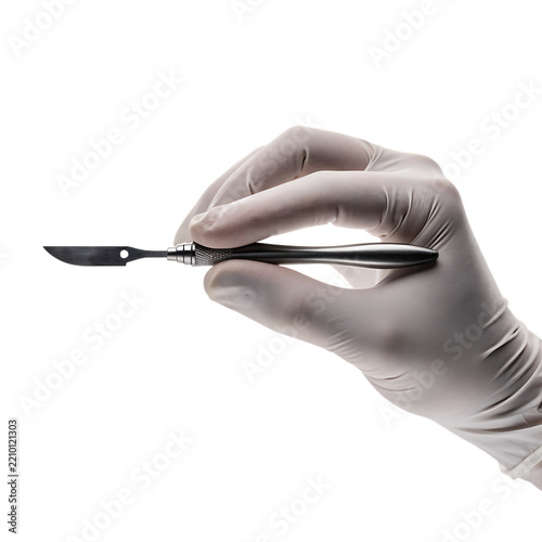 Surgeon hand in latex glove holding a stainless steel medical scalpel