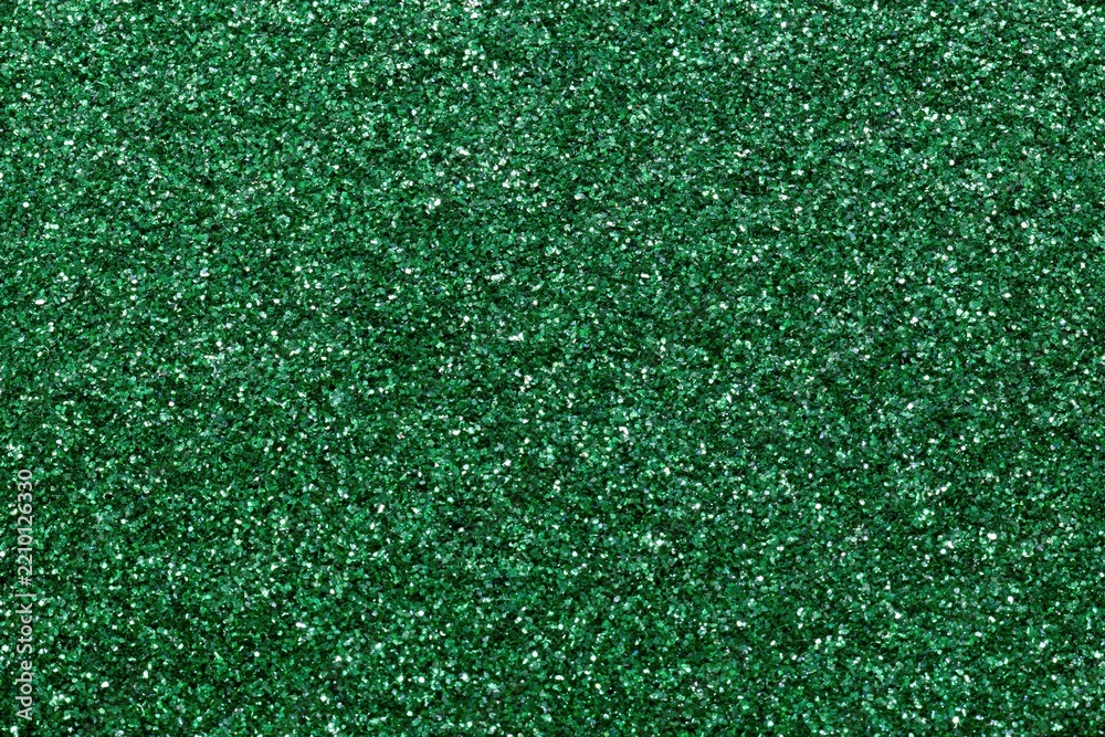 Fototapeta premium The Green Glitter Texture Closeup of Sparkling Surface for Festive Decor