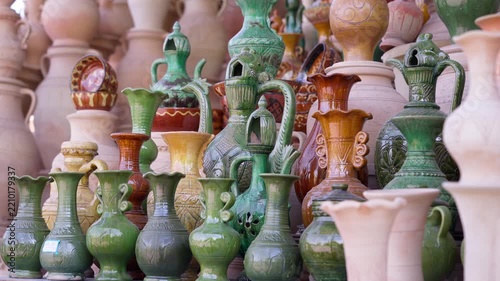 Traditional Glazed Ceramic Vases and Jugs Collection in Market Display