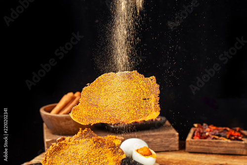 Dried beef crisps, beef crisps on a wooden background