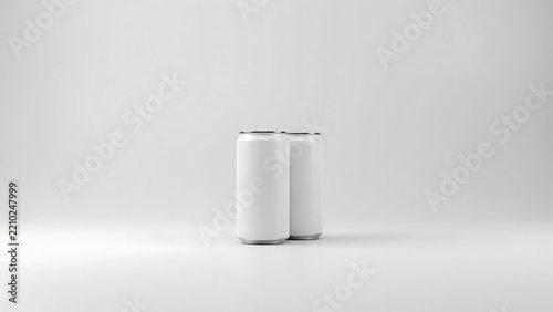 Two blank white aluminum beverage cans standing side by side on a plain light gray background