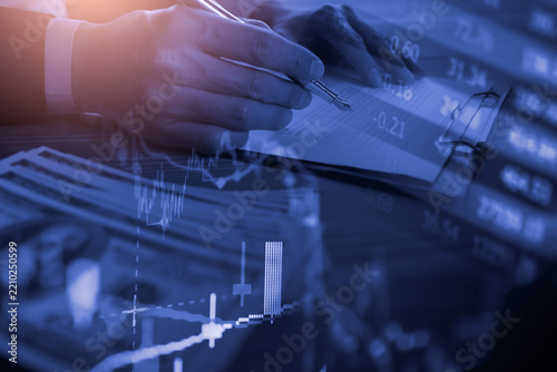 Business man on digital stock market financial indicator background. Digital business and stock market financial indicator on LED. Double exposure of business man and digital stock market financial.