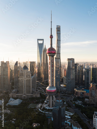 Photography The Shanghai CBD skyline seen in a close-up aerial view on a clear morning
