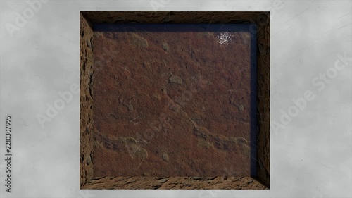 Top View of Excavated Earth Pit with Rusty Soil and Water Reflection