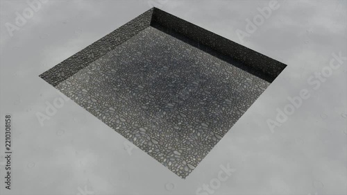Square Pit Excavated in Asphalt Surface