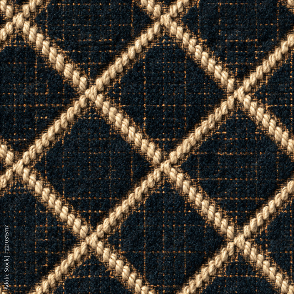 Obraz premium Seamless pattern navy blue fabric texture showing a diamond pattern with interwoven light beige ropes, providing a sophisticated textile background