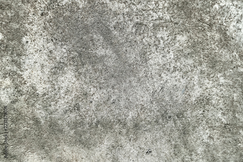 Grey concrete wall texture with rough weathered surface and copy