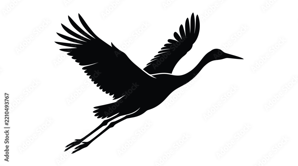 Obraz premium Black silhouette of a flying crane with outstretched wings against white