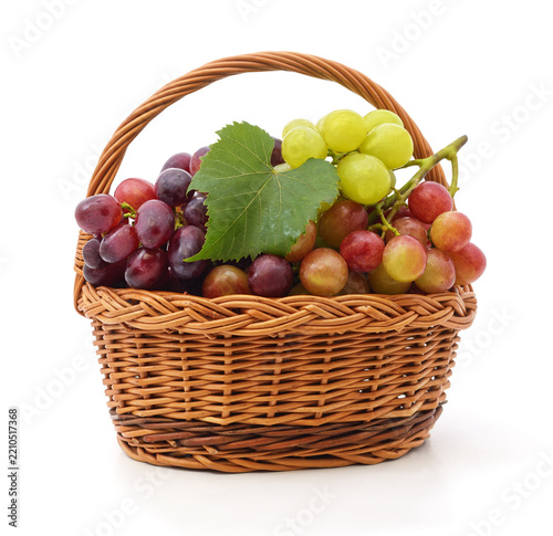 Fresh ripe grapes in wicker basket.