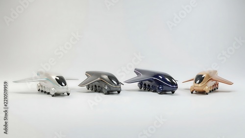 Four futuristic car-like robot toys in a row