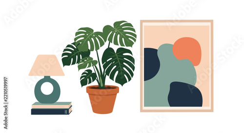 Home interior decoration with green monstera plant in pot, table lamp on books, and framed abstract art poster.