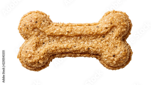 Crunchy bone-shaped dog treat with visible seeds, isolated on transparent background
