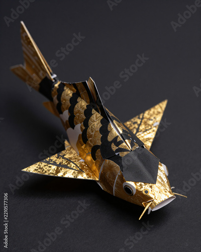 Macro black and gold leaf luxury papercraft koi fish head