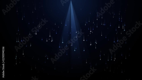 Abstract background with falling light particles and soft blue spotlight illumination