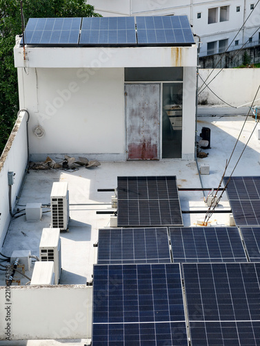 Rooftop solar panels installed on urban building