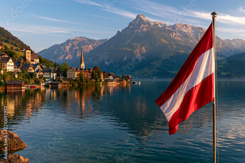 Alpine scenery in Austria with lake, mountains, and Austrian flag