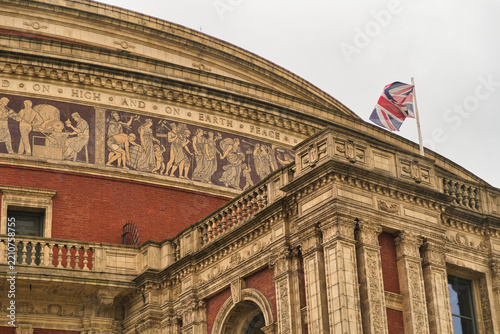 Royal Albert Hall under Cloudy Sky - The iconic Royal Albert Hall, a prominent concert venue and landmark, stands majestically in London under a dramatic, cloudy sky.