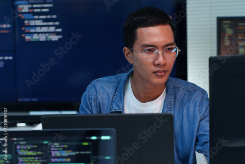 Focused Programmer Developing Digital Software