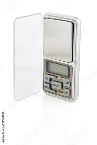 Digital pocket scale isolated on white background. High precision electronic jewelry scale.