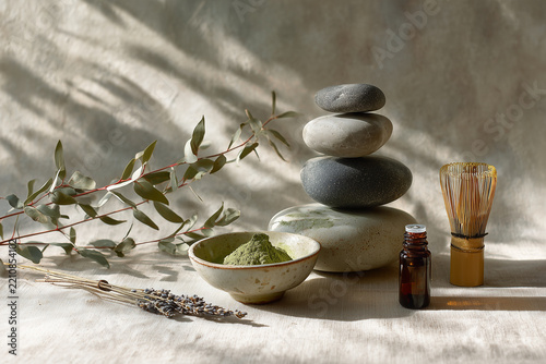 Holistic Wellness Still Life with Essential Oils Stones and Herbs for Meditation Spa and Health