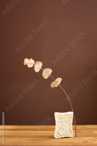 Natural herbal soap with scrub. Handmade soap bars on a wooden background. Space for text. 