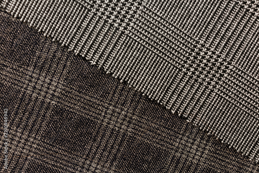 Fototapeta premium Two textured wool blend suiting fabrics with contrasting weaves