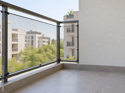 Fine pet guard mesh attached to a small balcony railing
