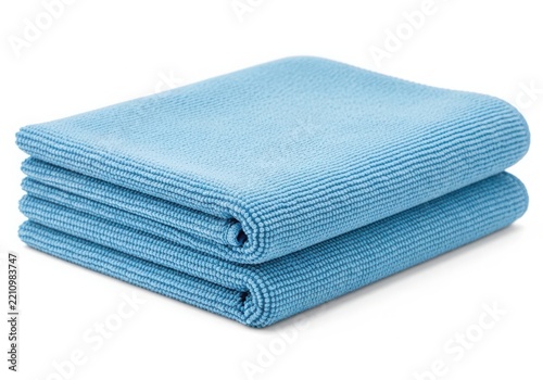 Stack of light blue folded fabric towels
