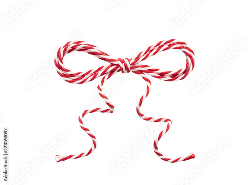 Red and white twine bow isolated on transparent background