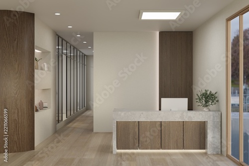 Marble reception desk with wooden cabinets, computer, plant and glass wall in parquet hallway.