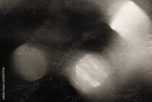 Old film texture with scratches, noise and light leaks. Realistic transparent overlay film texture in black-white, dust and grain. Distressed retro movie or photo negative effect of cinema nostalgia