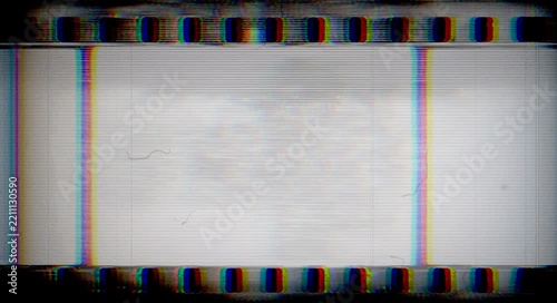 Vintage film strip celluloid background featuring retro film grain, scratches, flicker, RGB chromatic aberration and glitch effects suitable for overlays, transitions