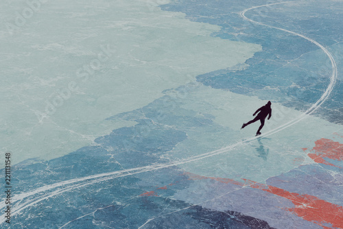 Speed skater on a frozen lake