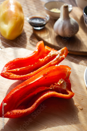Fresh Red Bell Pepper and Garlic with Asian Cooking Ingredients