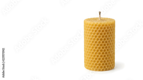 Natural textured sustainable beeswax candle with minimalist design, concept for eco-lodge ambiance, wellness retreats and green infrastructure branding