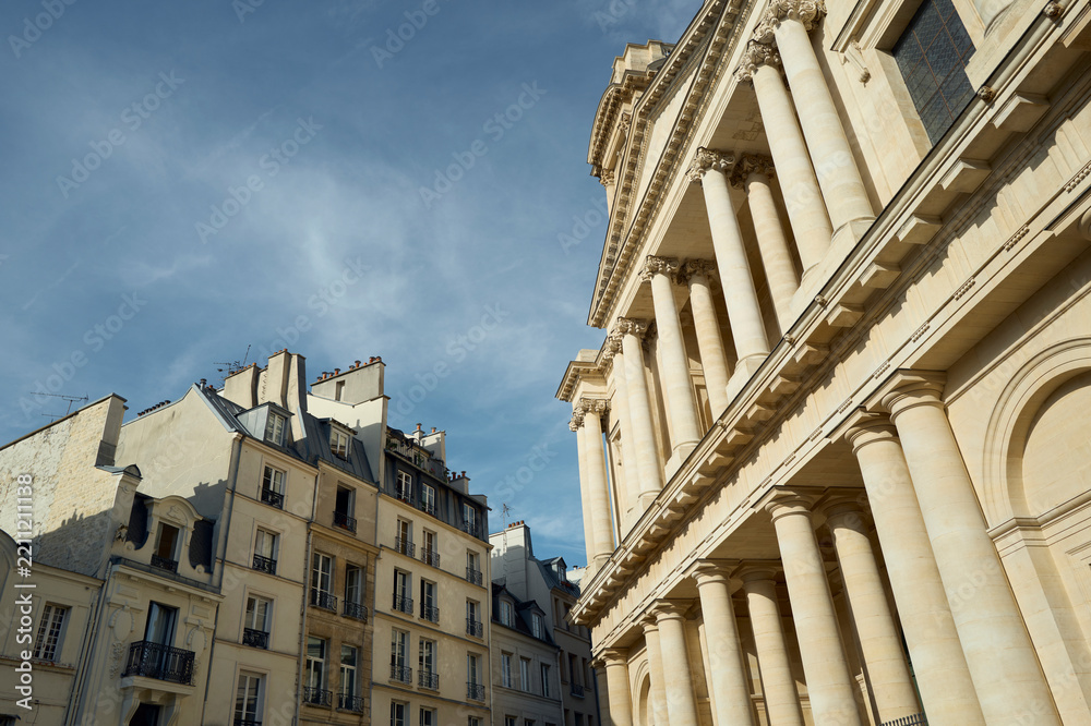 Obraz premium Low angle view of Paris buildings against blue sky