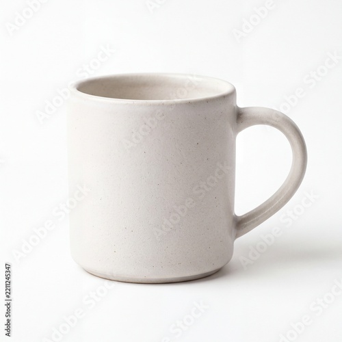 Minimalist cream ceramic mug on white background, modern stoneware coffee cup for branding mockup, neutral matte textured tea cup