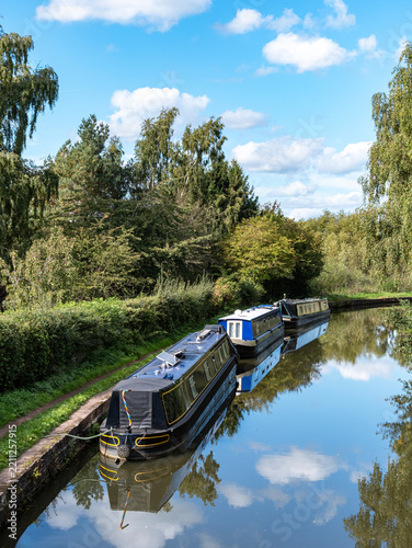 Moored canal boats in the countryside