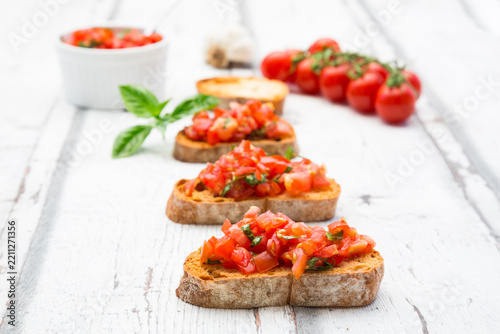 Bruschetta with tomato, basil, garlic and white breah