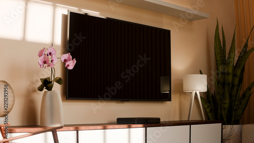 Modern living room with wall-mounted flat screen tv and indoor plants