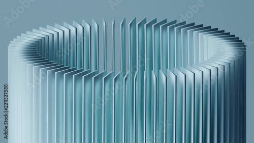 A circular ring of metallic panels expanding into a cylinder
