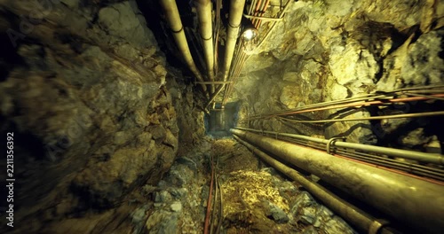 abandoned mine shaft plunging into darkness, rusted pipes and cables line narrow rocky corridor under crumbling supports, scattered debris and timber create